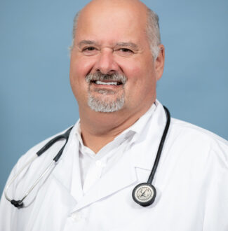 Dr. Aron Schlau, MD, FACP